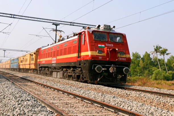 train-moving-with-electric-support-through-the-indian-railway-track.jpg